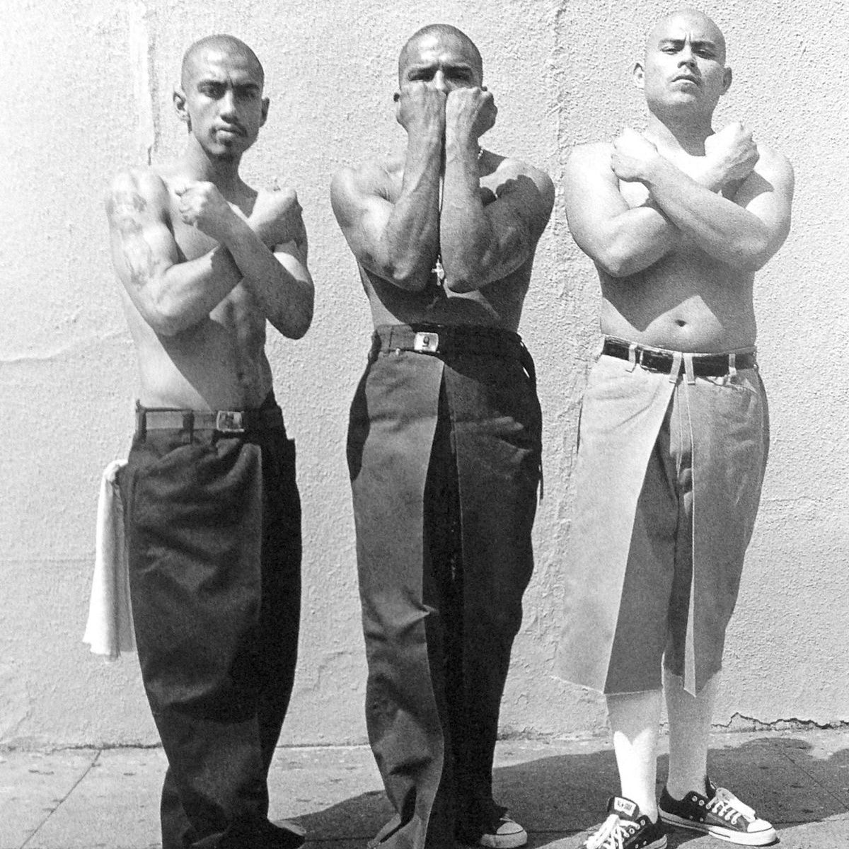 Chicanos wearing FB County work pants